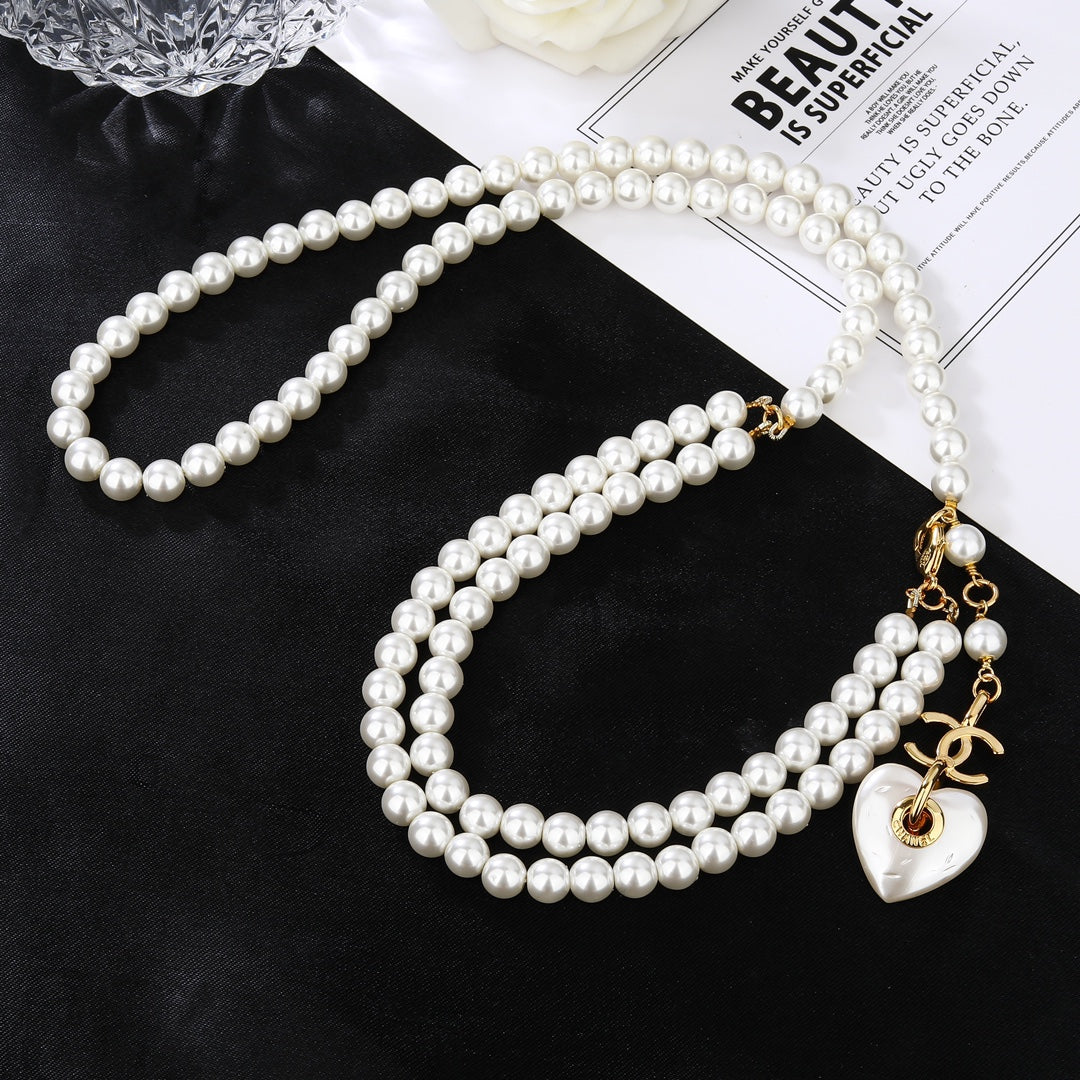 CHANEL 25S CHAIN BELT IN WHITE PEARL 614404