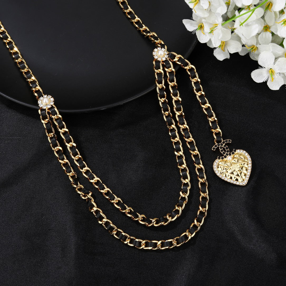 CHANEL 25S CHAIN BELT IN GOLD METALLIC AND BLACK CALFSKIN 614286